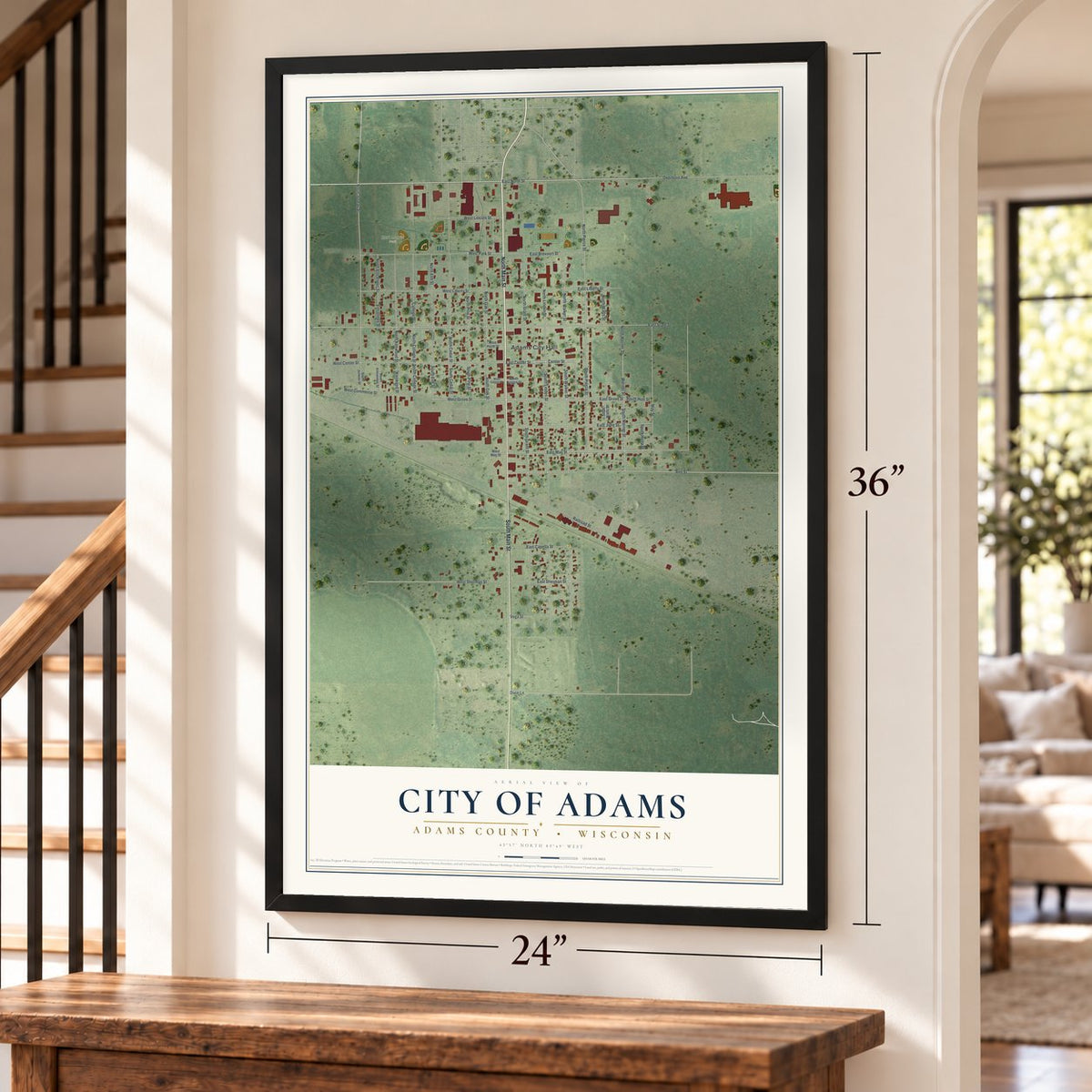 Adams, Wisconsin map, 24 x 36 inch print in a black frame by a staircase