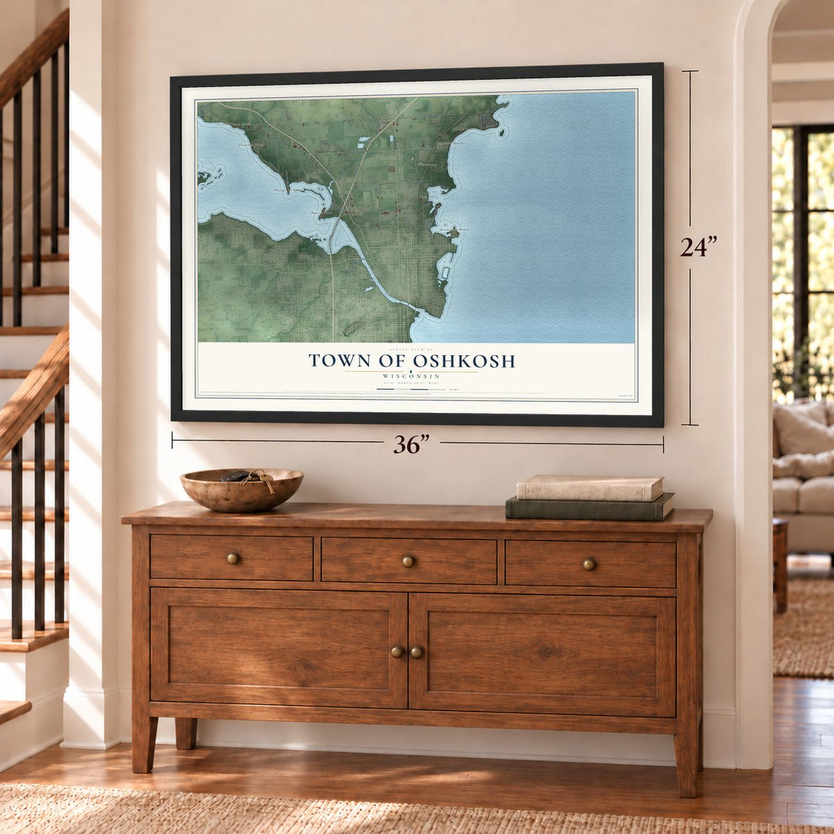 Town of Oshkosh, Wisconsin map, 24 x 36 inch print in a black frame above a dresser by a staircase