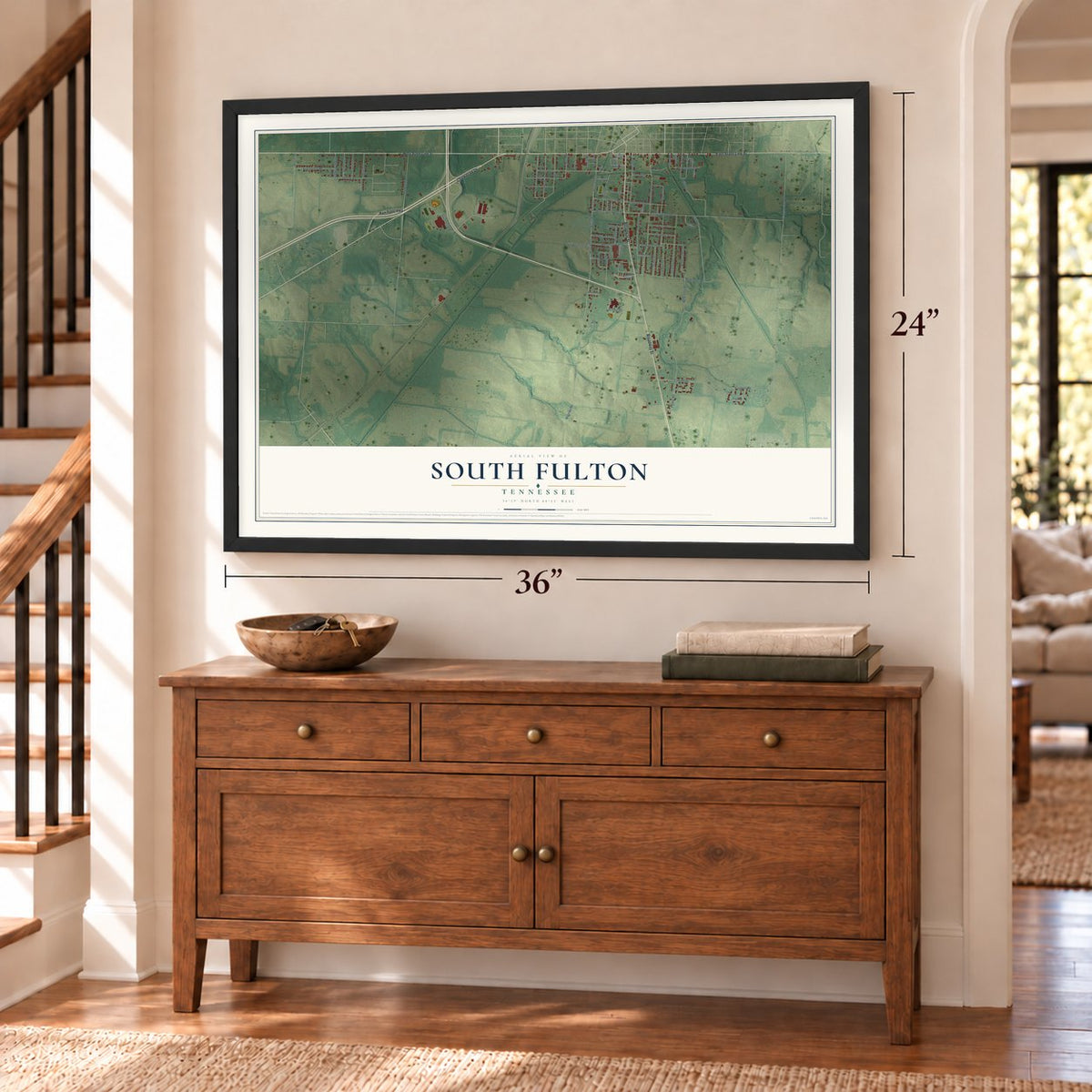 South Fulton, Tennessee map, 24 x 36 inch print in a black frame above a dresser by a staircase