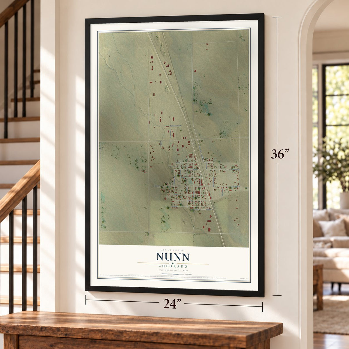 Nunn, Colorado map, 24 x 36 inch print in a black frame by a staircase