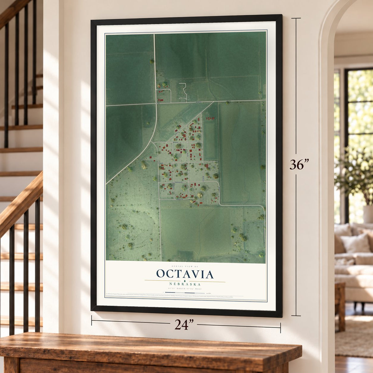 Octavia, Nebraska map, 24 x 36 inch print in a black frame by a staircase