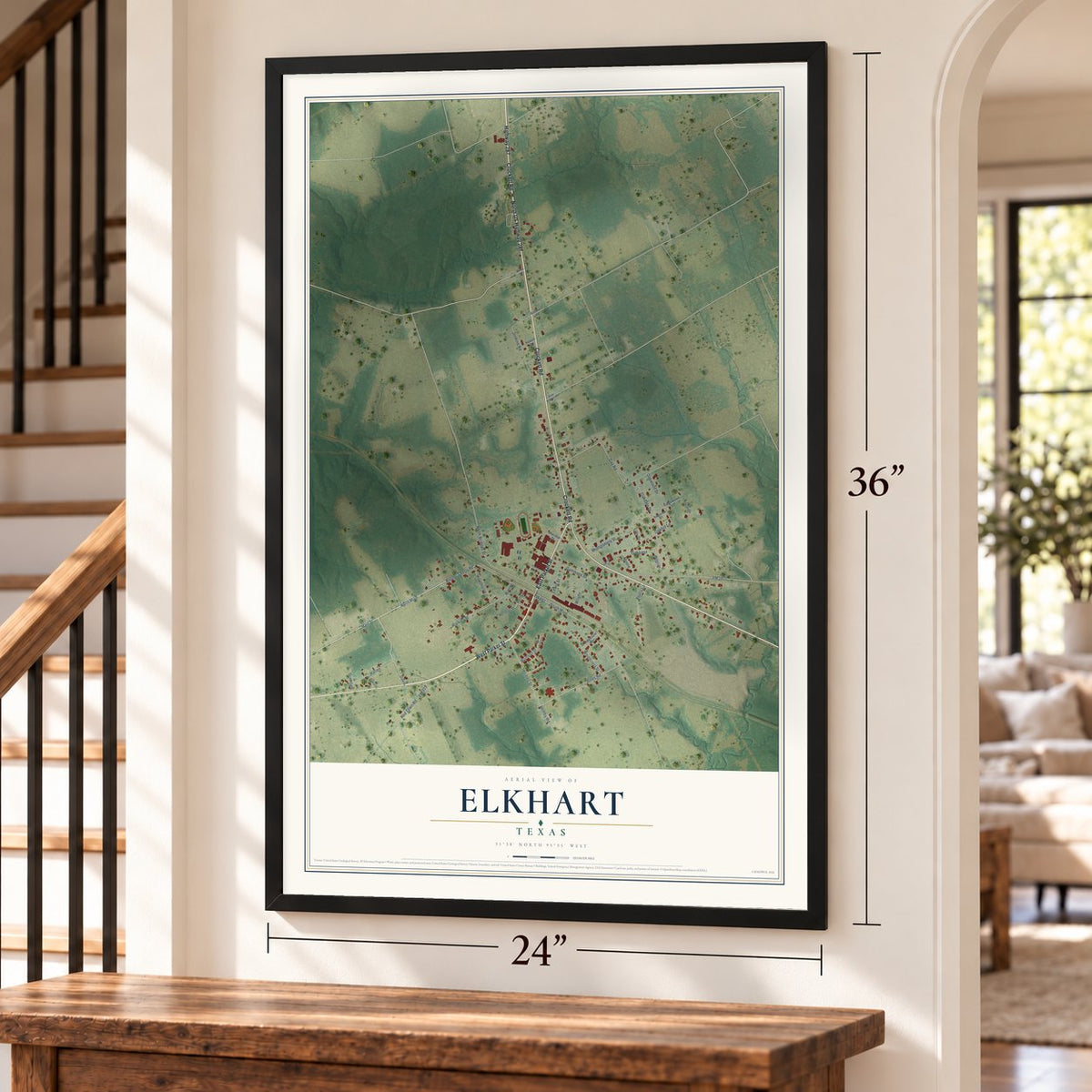 Elkhart, Texas map, 24 x 36 inch print in a black frame by a staircase