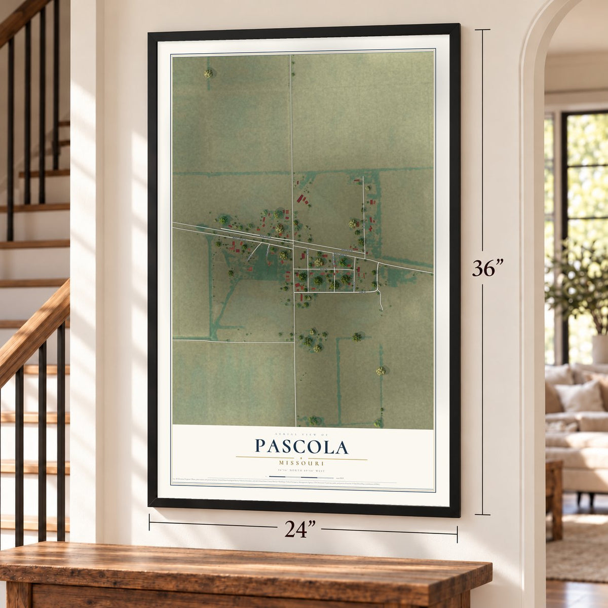 Pascola, Missouri map, 24 x 36 inch print in a black frame by a staircase