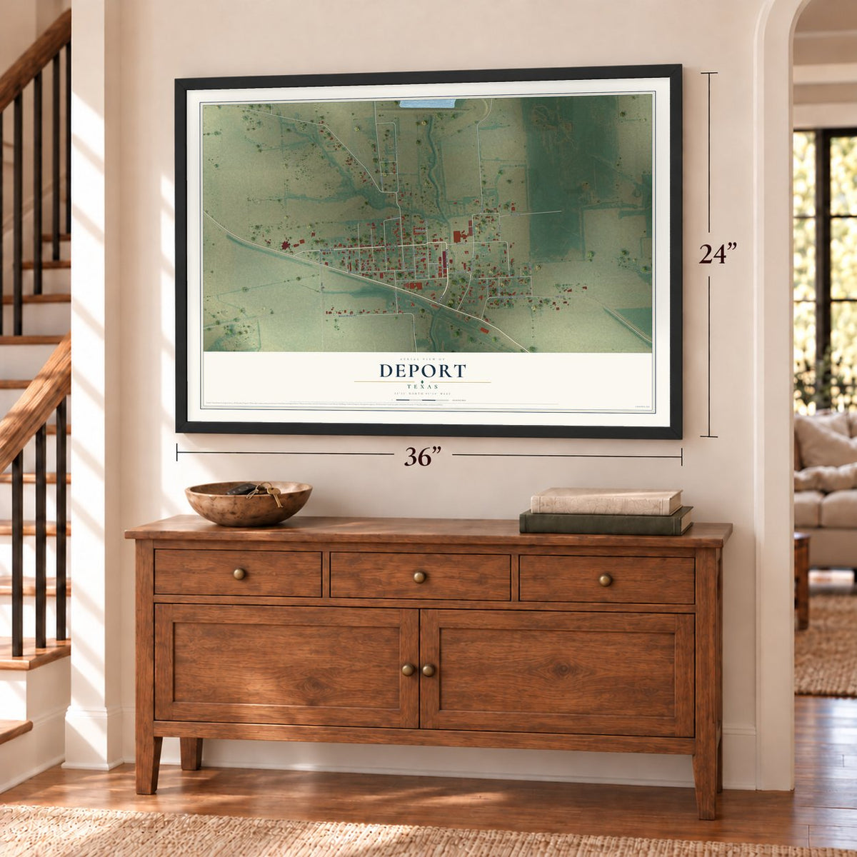 Deport, Texas map, 24 x 36 inch print in a black frame above a dresser by a staircase