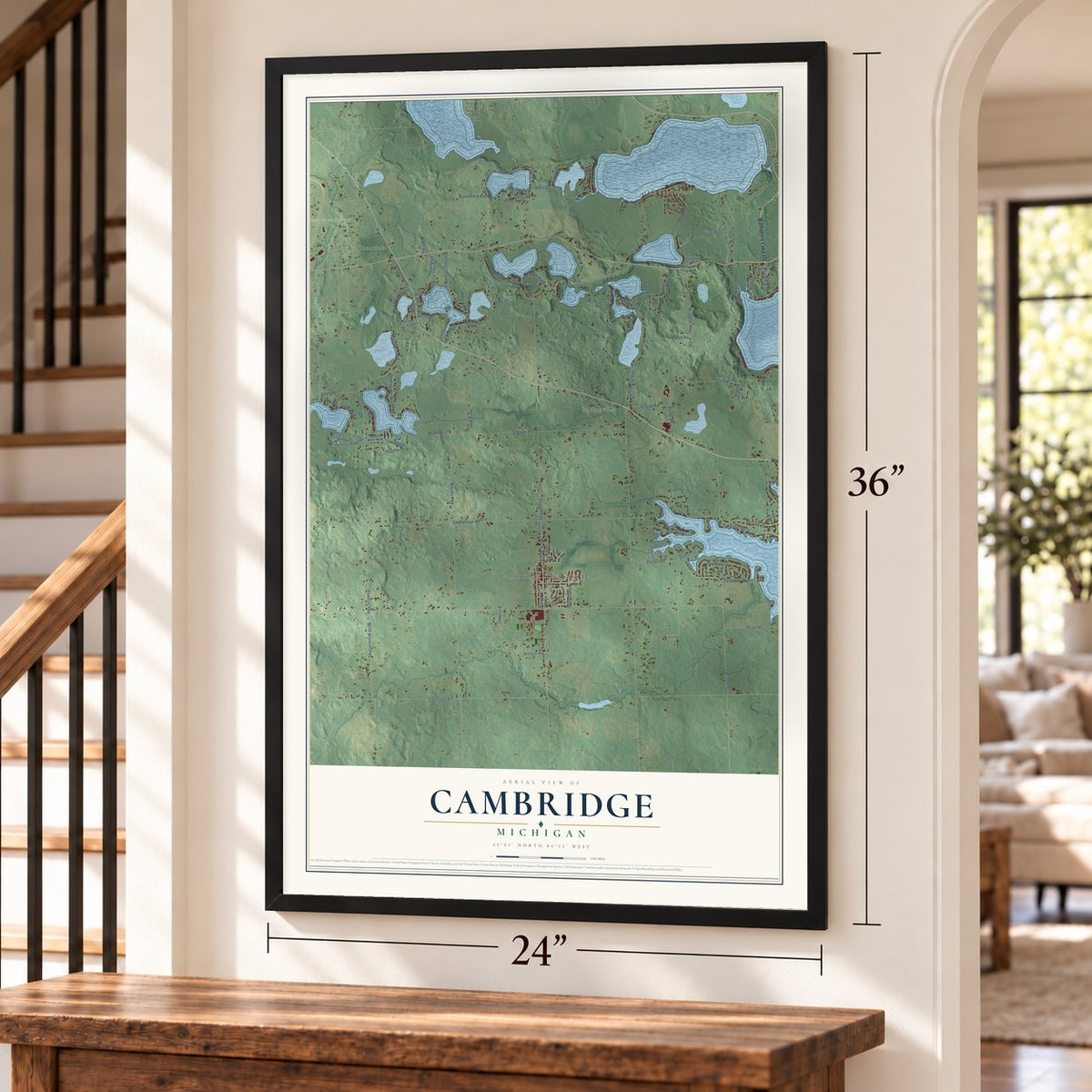 Cambridge, Michigan map, 24 x 36 inch print in a black frame by a staircase