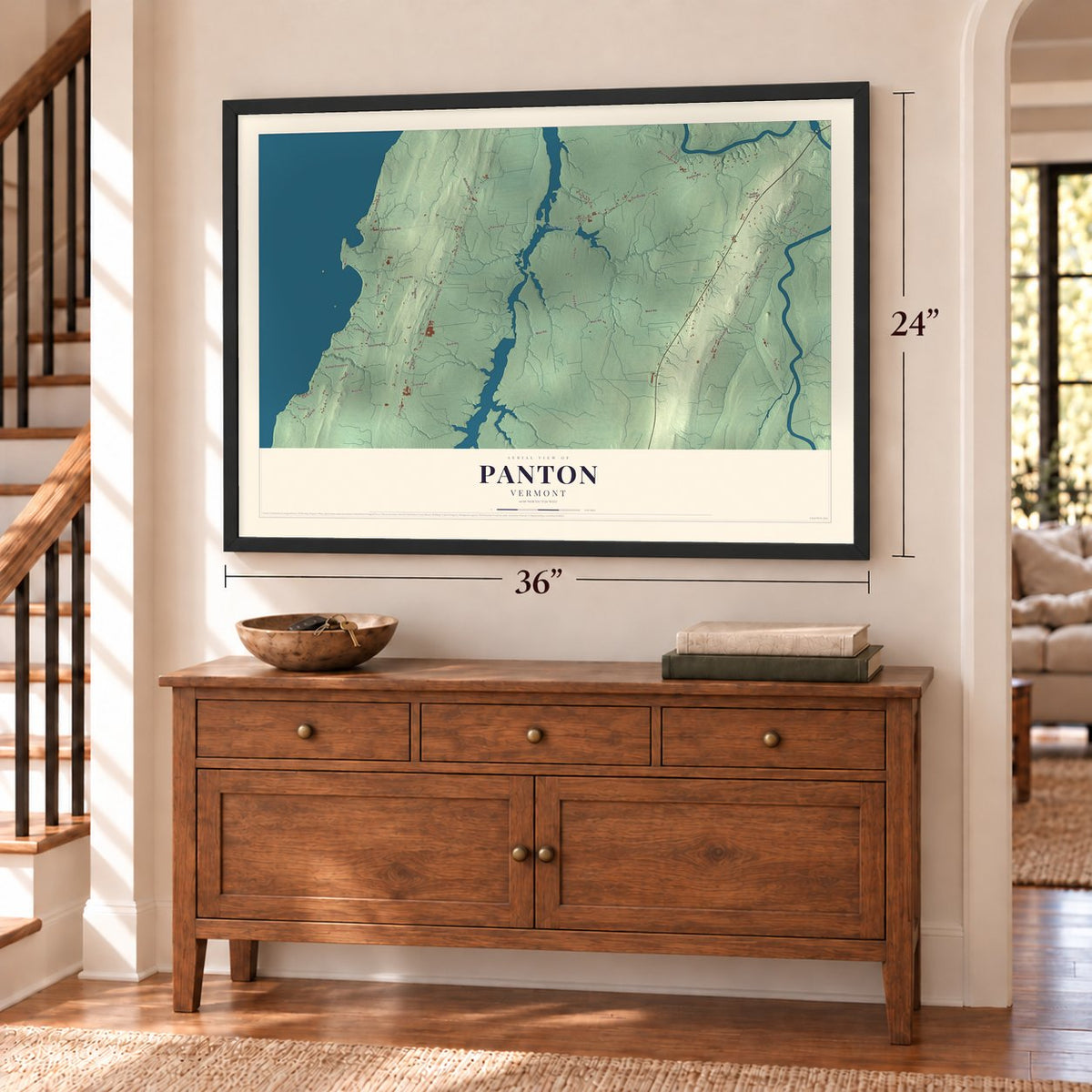 Panton, Vermont map, 24 x 36 inch print in a black frame above a dresser by a staircase