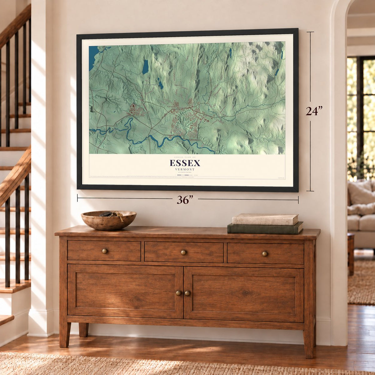 Essex, Vermont map, 24 x 36 inch print in a black frame above a dresser by a staircase
