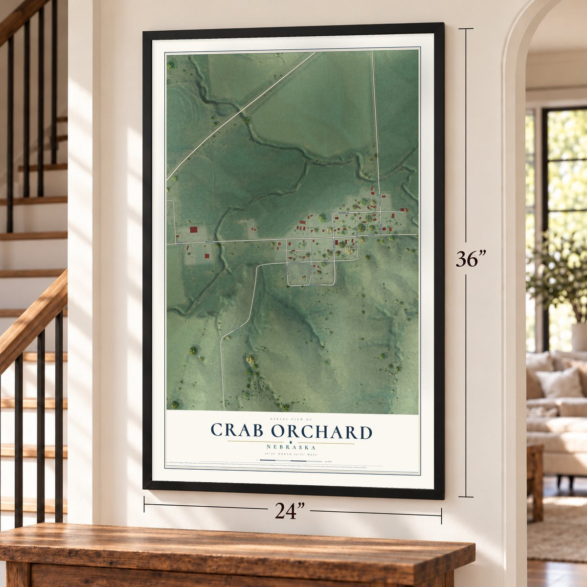 Crab Orchard, Nebraska map, 24 x 36 inch print in a black frame by a staircase