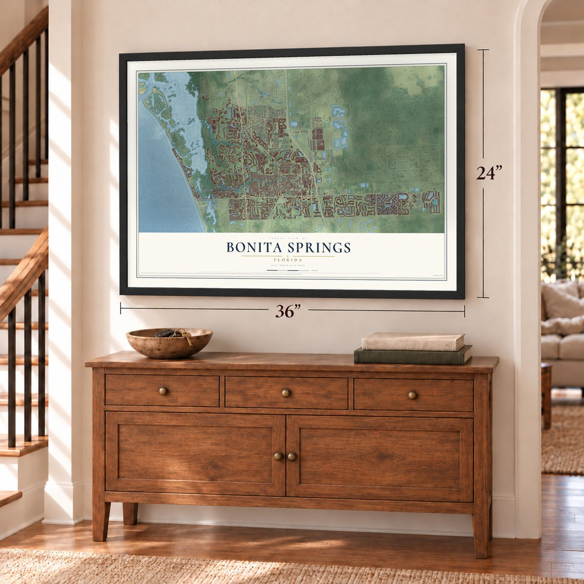 Bonita Springs, Florida map, 24 x 36 inch print in a black frame above a dresser by a staircase