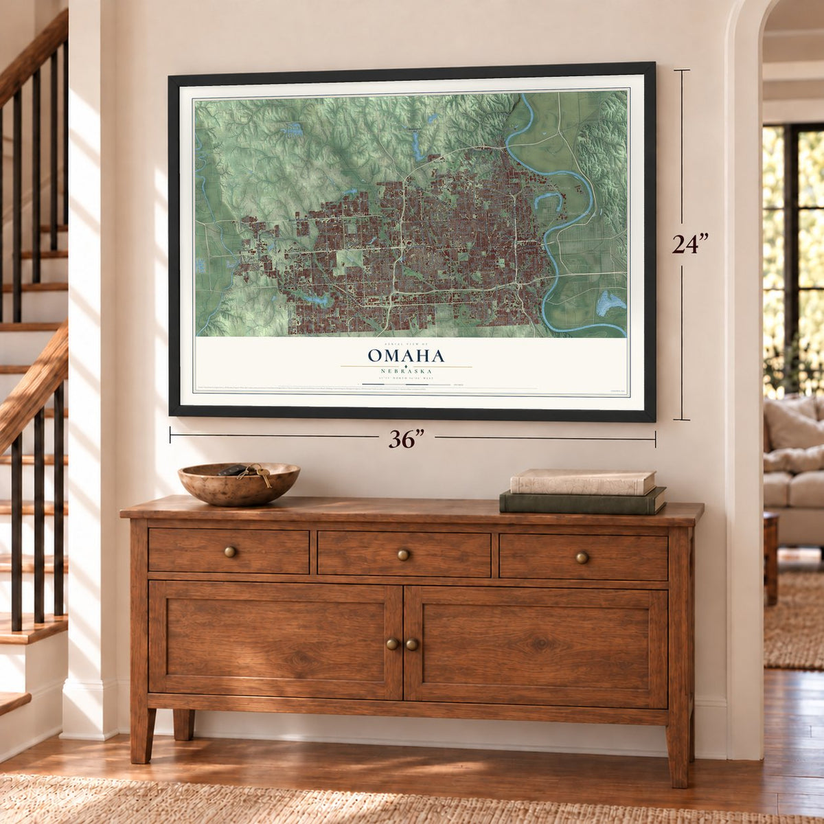 Omaha, Nebraska map, 24 x 36 inch print in a black frame above a dresser by a staircase