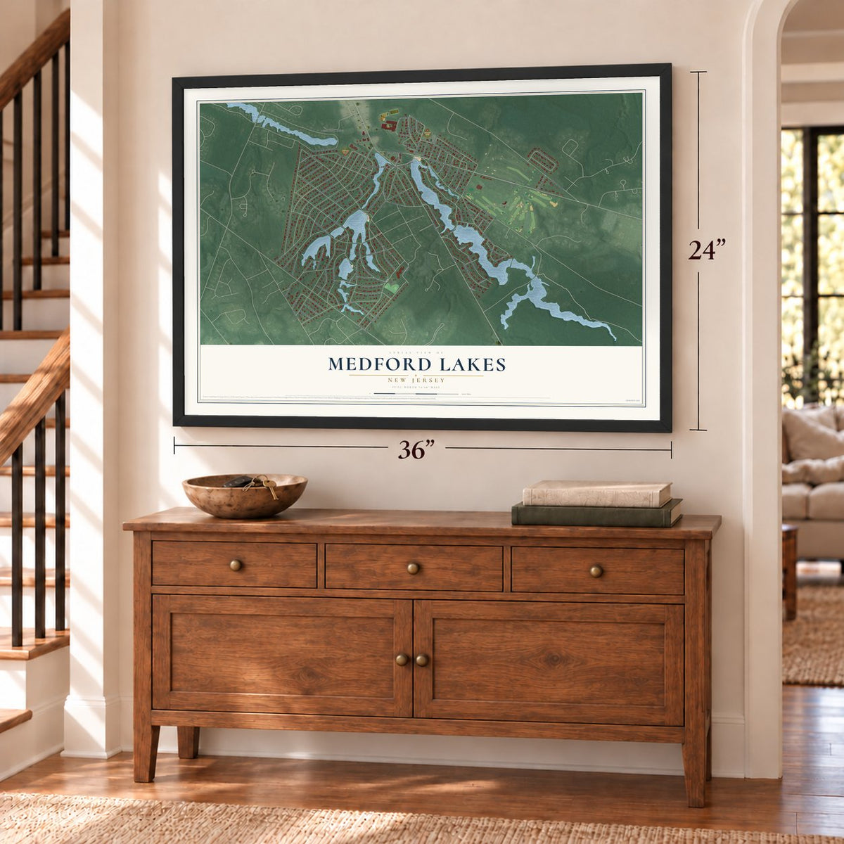 Medford Lakes, New Jersey map, 24 x 36 inch print in a black frame above a dresser by a staircase