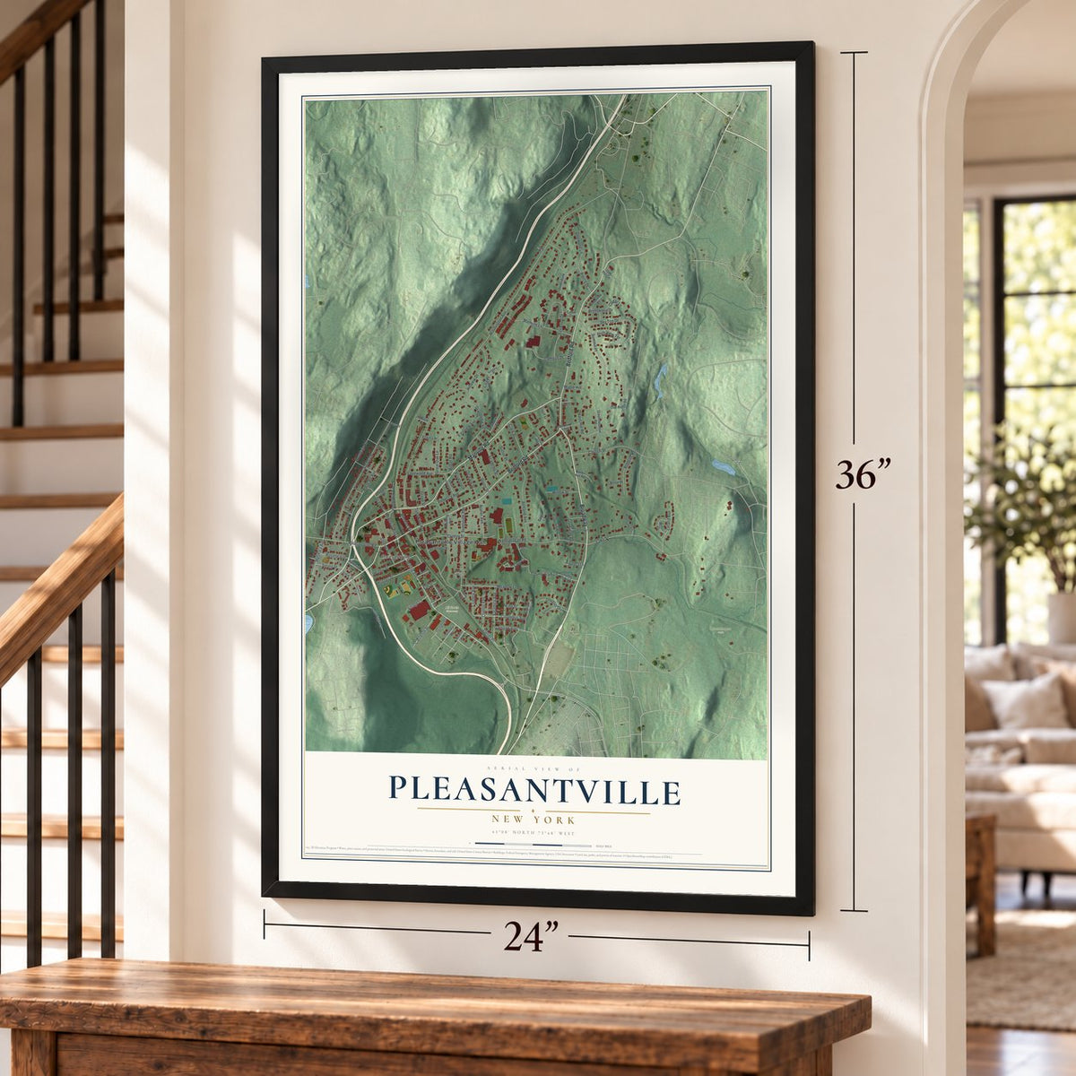 Pleasantville, New York map, 24 x 36 inch print in a black frame by a staircase