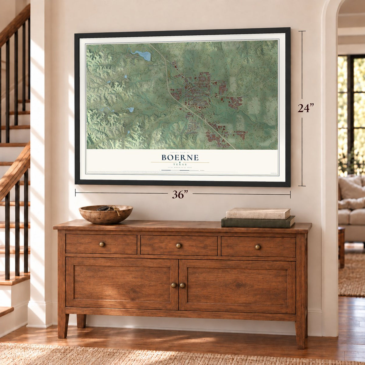 Boerne, Texas map, 24 x 36 inch print in a black frame above a dresser by a staircase