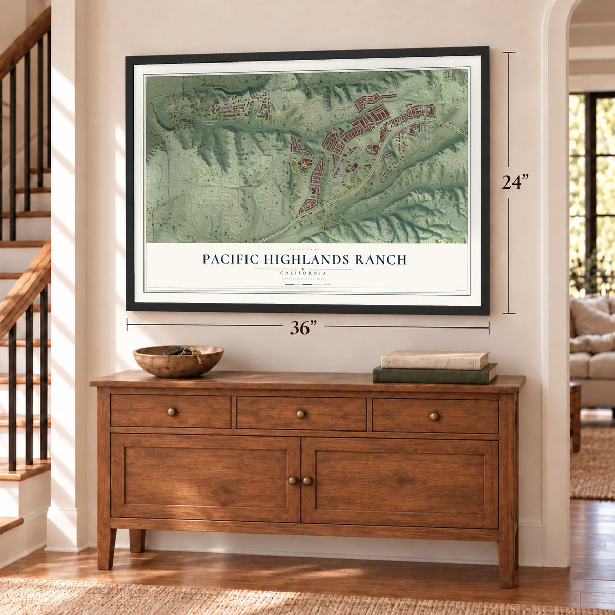 Pacific Highlands Ranch, California map, 24 x 36 inch print in a black frame above a dresser by a staircase