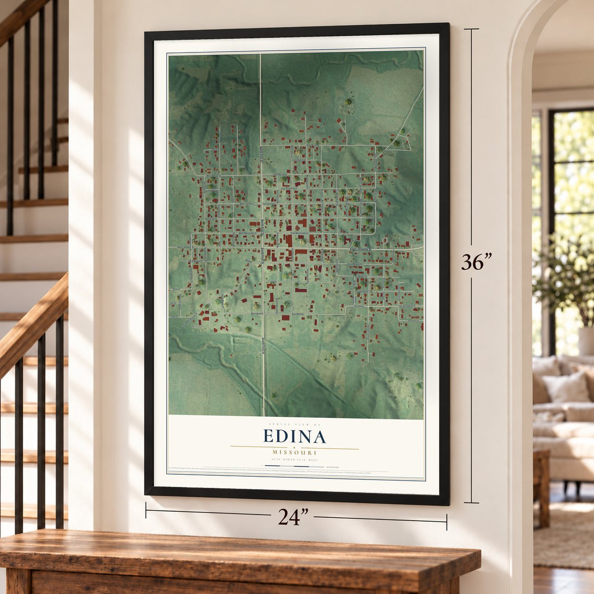 Edina, Missouri map, 24 x 36 inch print in a black frame by a staircase