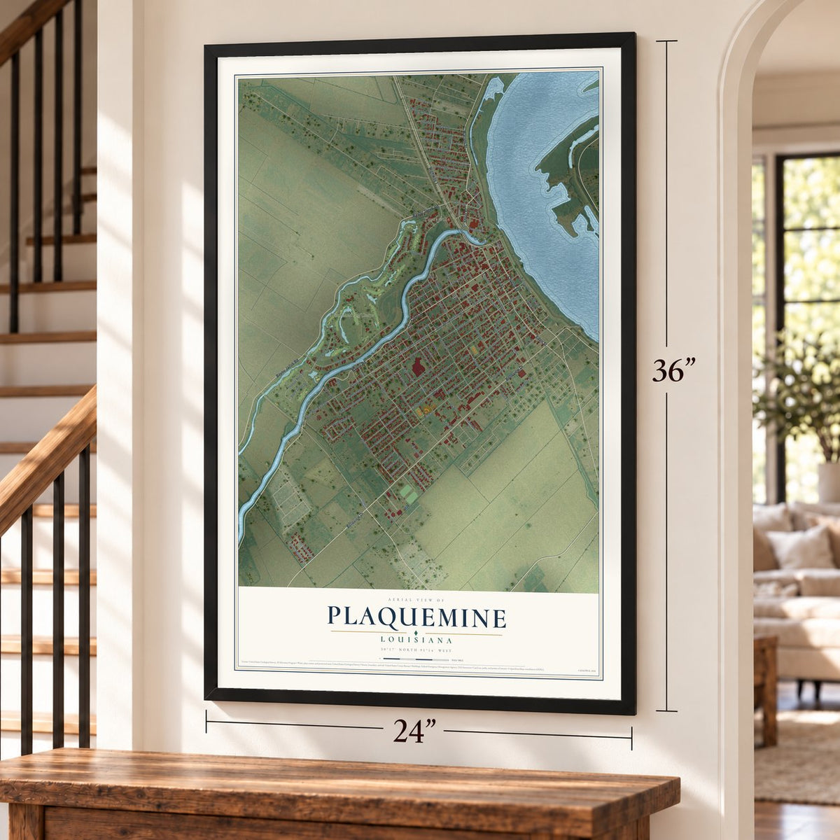 Plaquemine, Louisiana map, 24 x 36 inch print in a black frame by a staircase