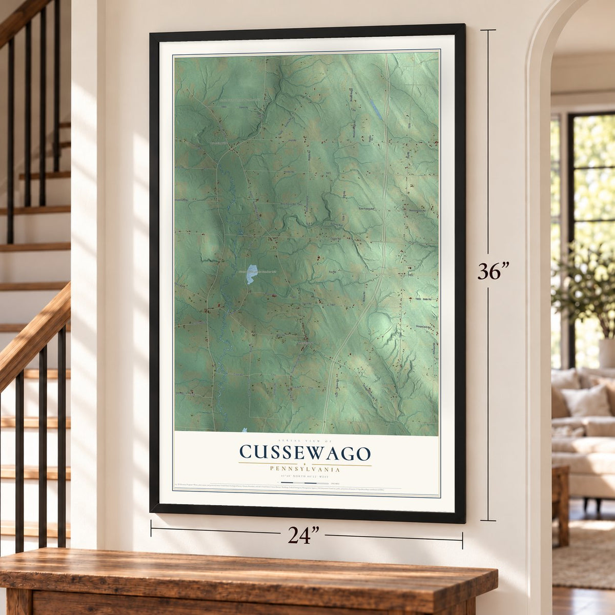 Cussewago, Pennsylvania map, 24 x 36 inch print in a black frame by a staircase