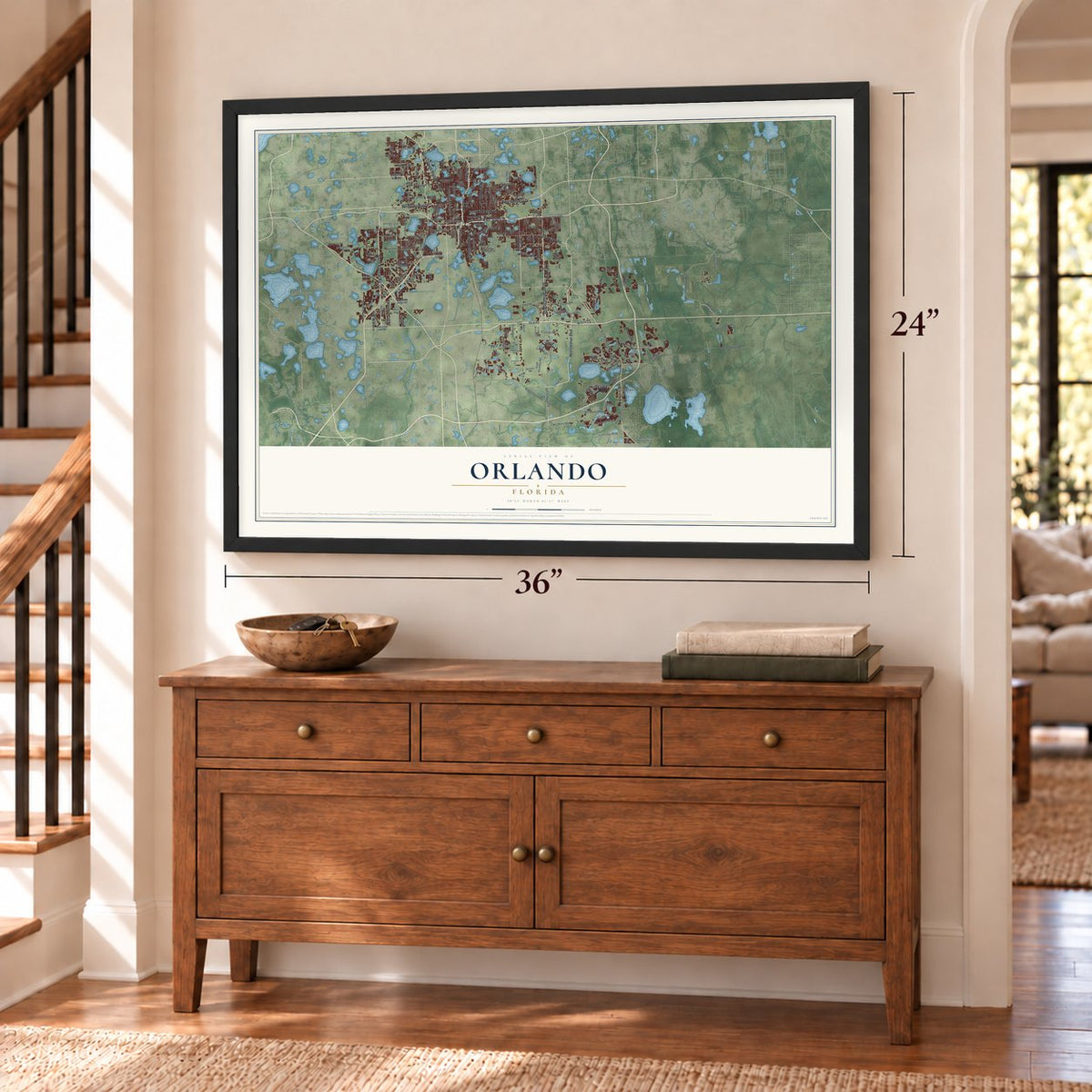 Orlando, Florida map, 24 x 36 inch print in a black frame above a dresser by a staircase