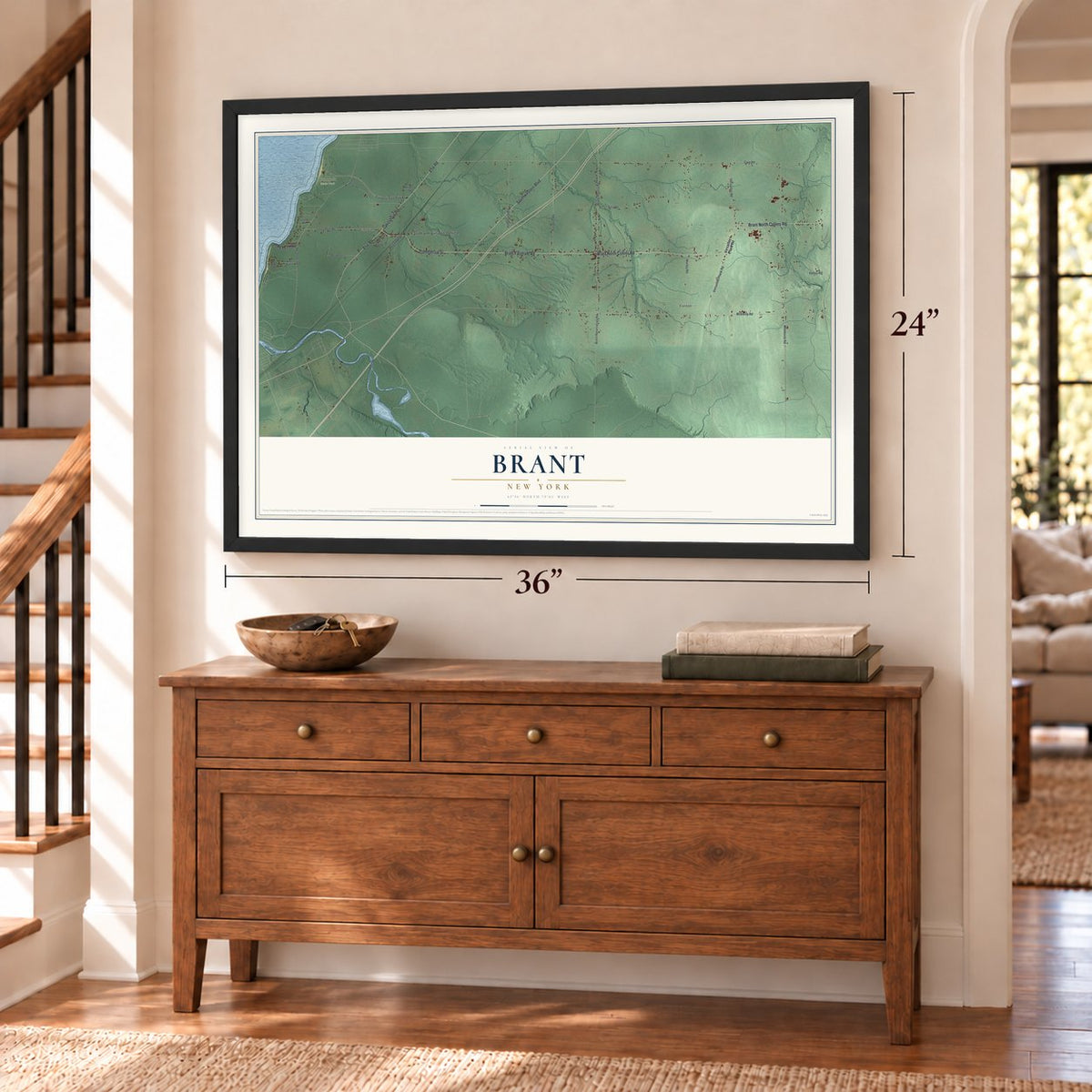 Brant, New York map, 24 x 36 inch print in a black frame above a dresser by a staircase