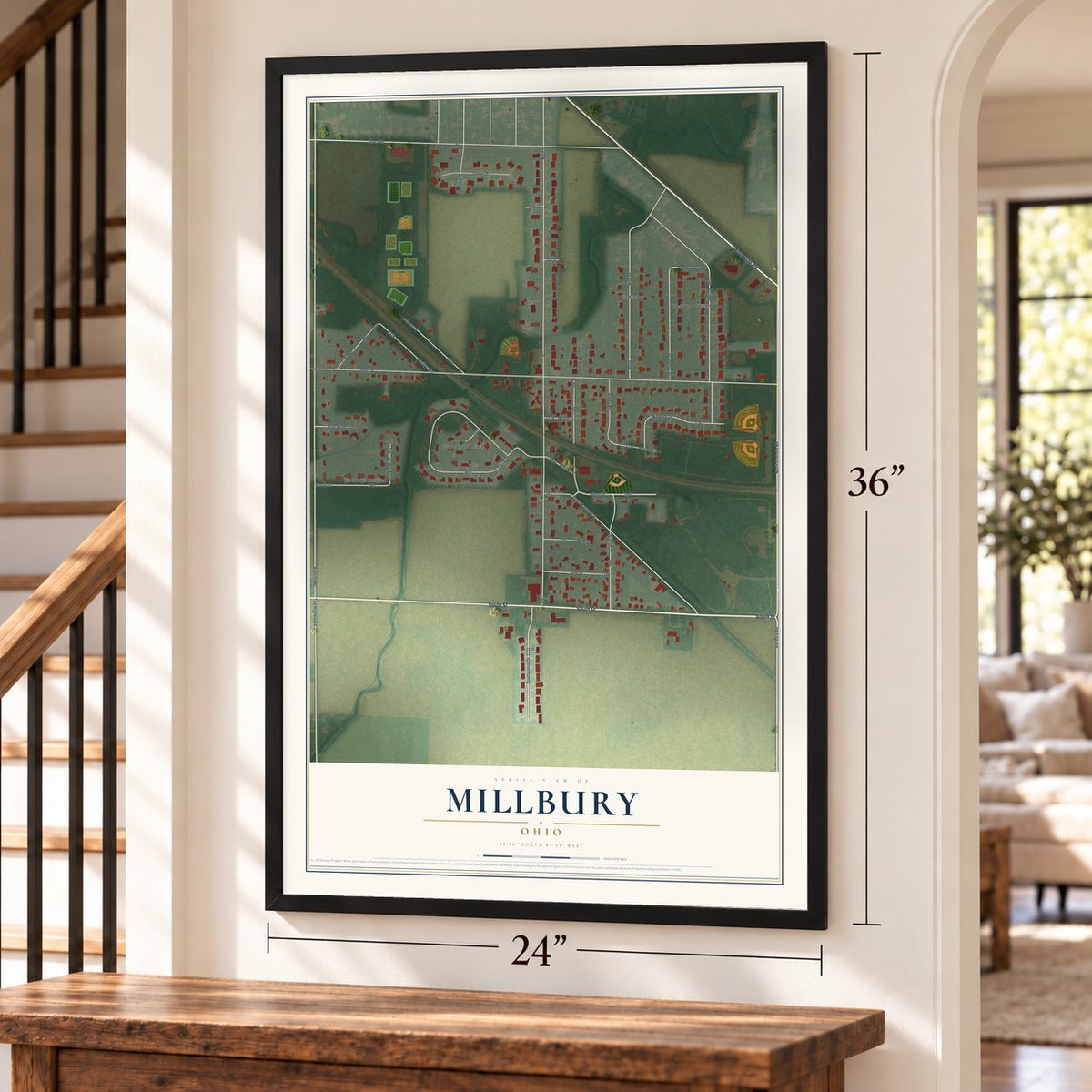 Millbury, Ohio map, 24 x 36 inch print in a black frame by a staircase