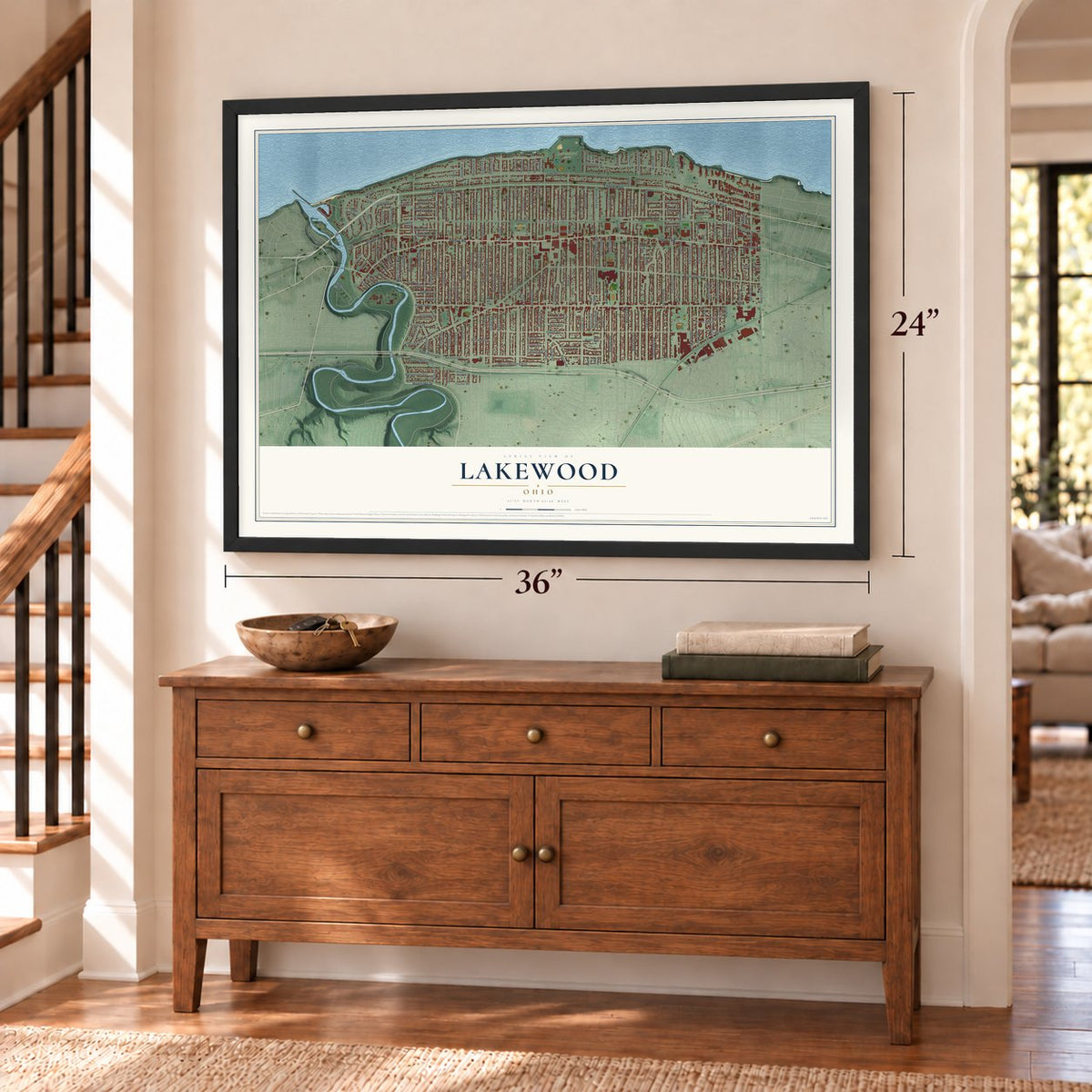 Lakewood, Ohio map, 24 x 36 inch print in a black frame above a dresser by a staircase
