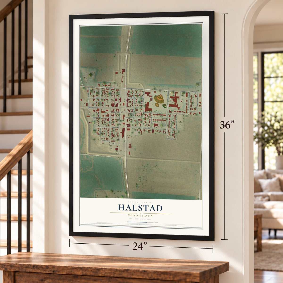 Halstad, Minnesota map, 24 x 36 inch print in a black frame by a staircase