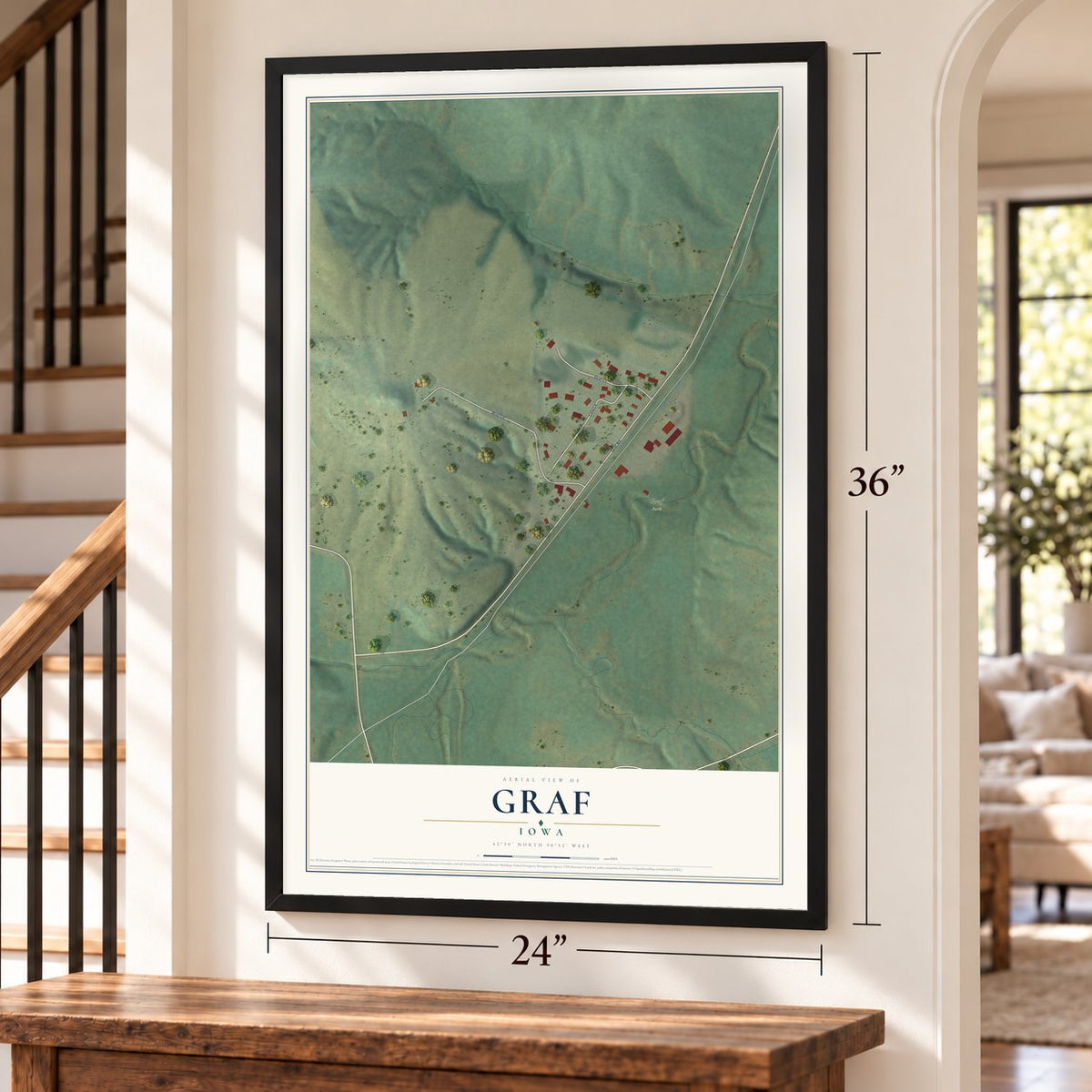 Graf, Iowa map, 24 x 36 inch print in a black frame by a staircase