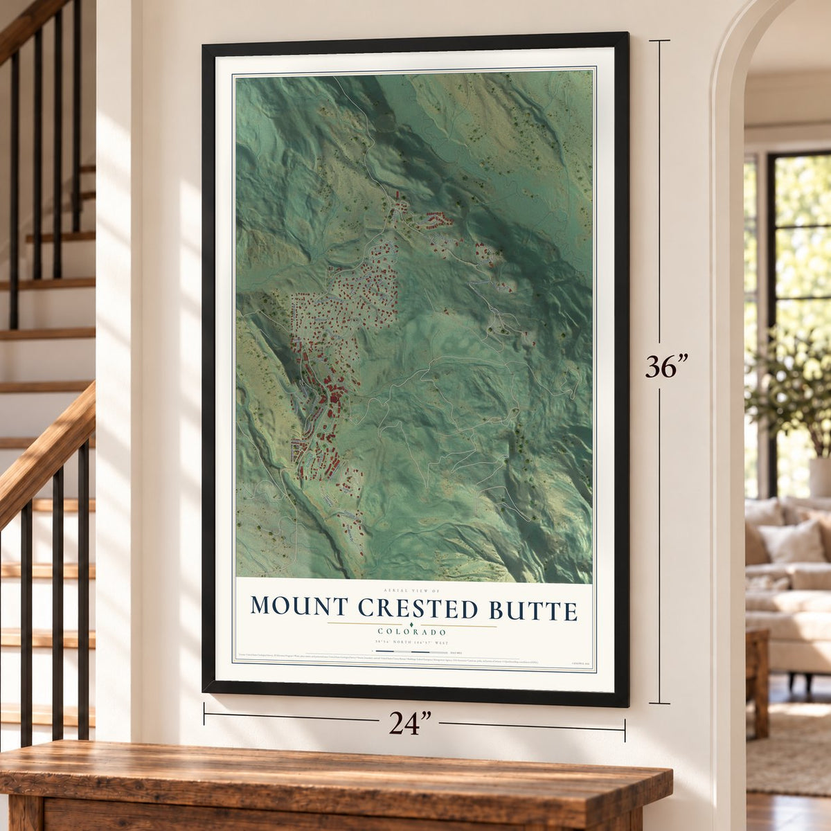Mount Crested Butte, Colorado map, 24 x 36 inch print in a black frame by a staircase