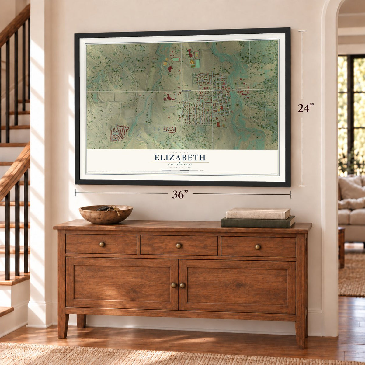 Elizabeth, Colorado map, 24 x 36 inch print in a black frame above a dresser by a staircase