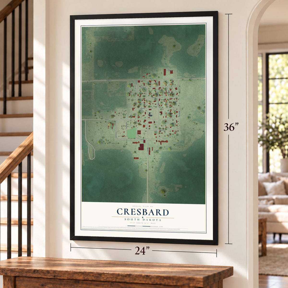 Cresbard, South Dakota map, 24 x 36 inch print in a black frame by a staircase