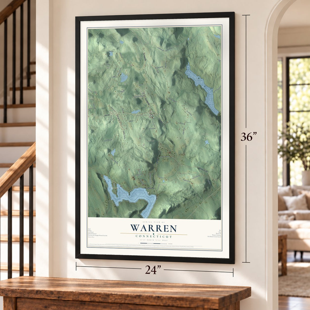 Warren, Connecticut map, 24 x 36 inch print in a black frame by a staircase