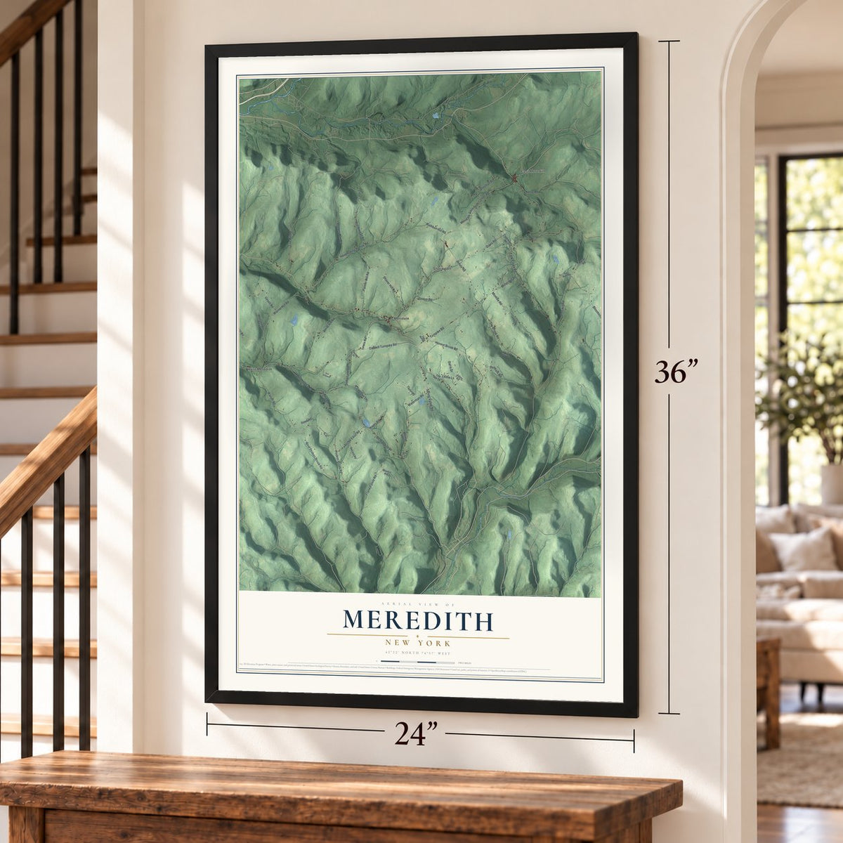 Meredith, New York map, 24 x 36 inch print in a black frame by a staircase