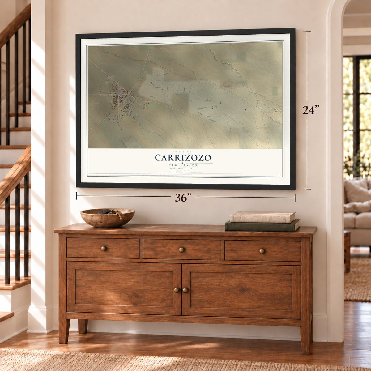 Carrizozo, New Mexico map, 24 x 36 inch print in a black frame above a dresser by a staircase