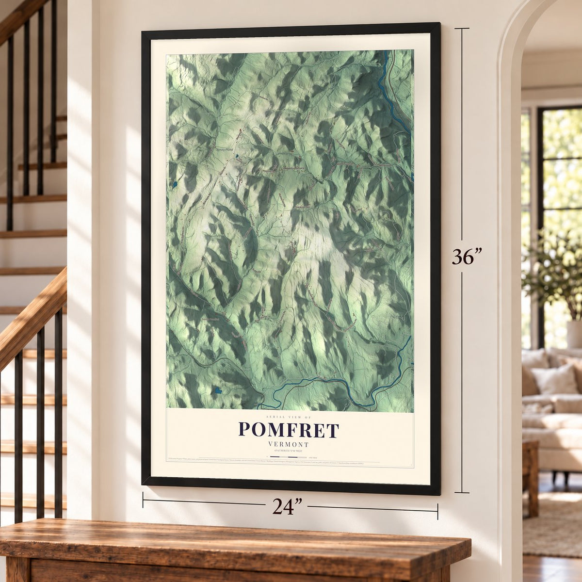 Pomfret, Vermont map, 24 x 36 inch print in a black frame by a staircase