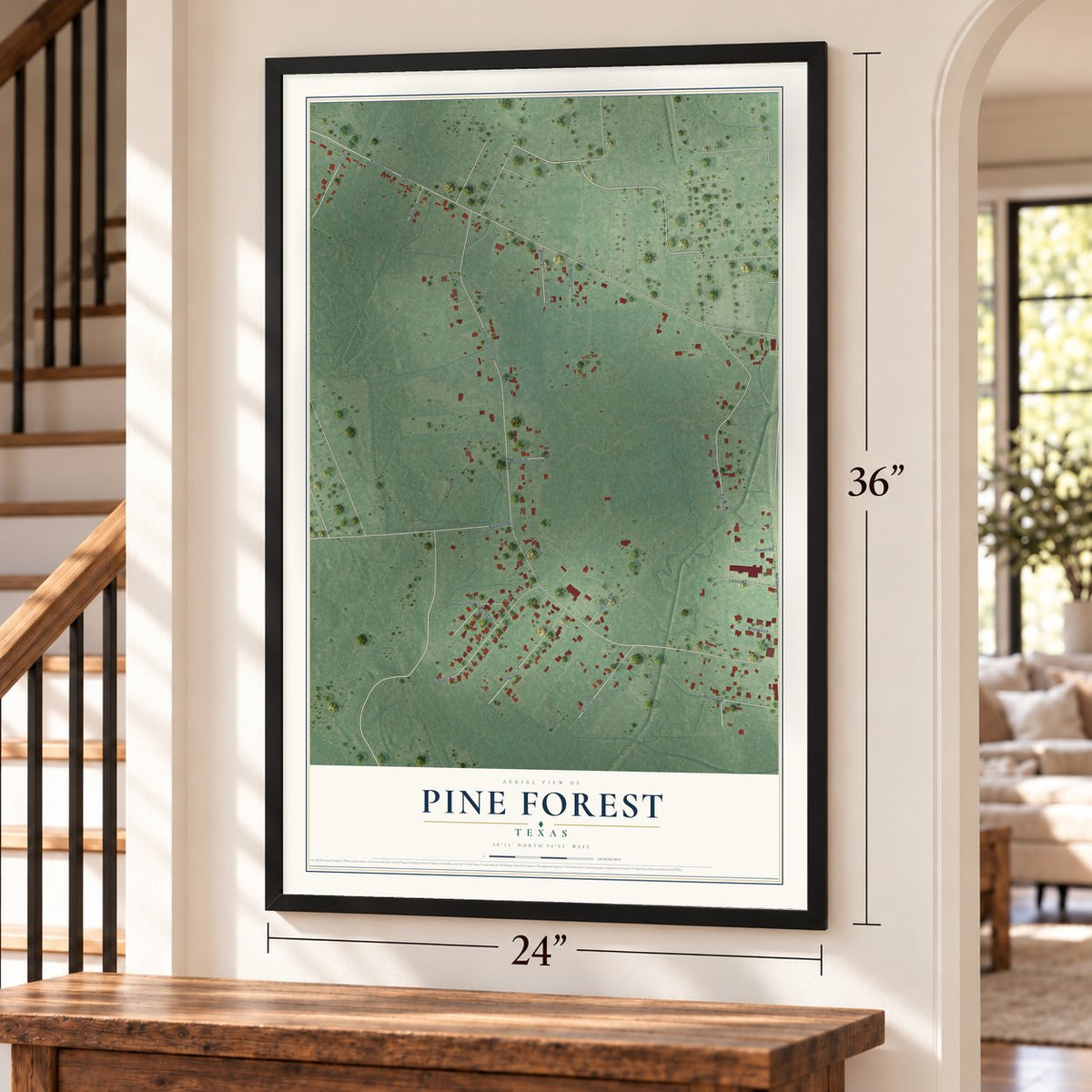 Pine Forest, Texas map, 24 x 36 inch print in a black frame by a staircase