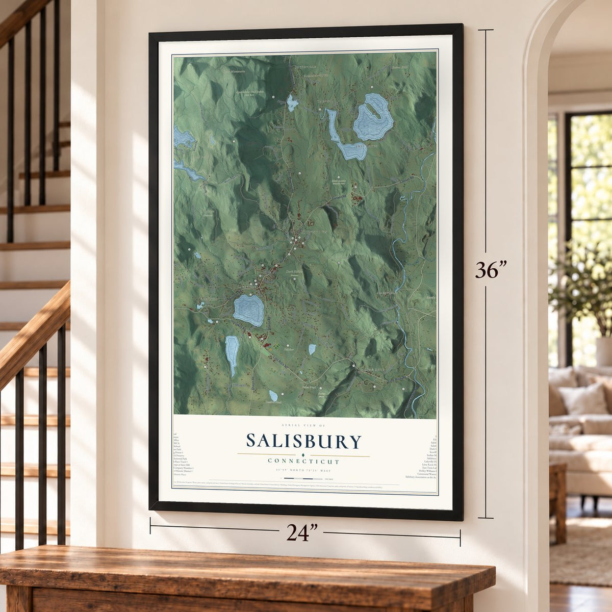Salisbury, Connecticut map, 24 x 36 inch print in a black frame by a staircase