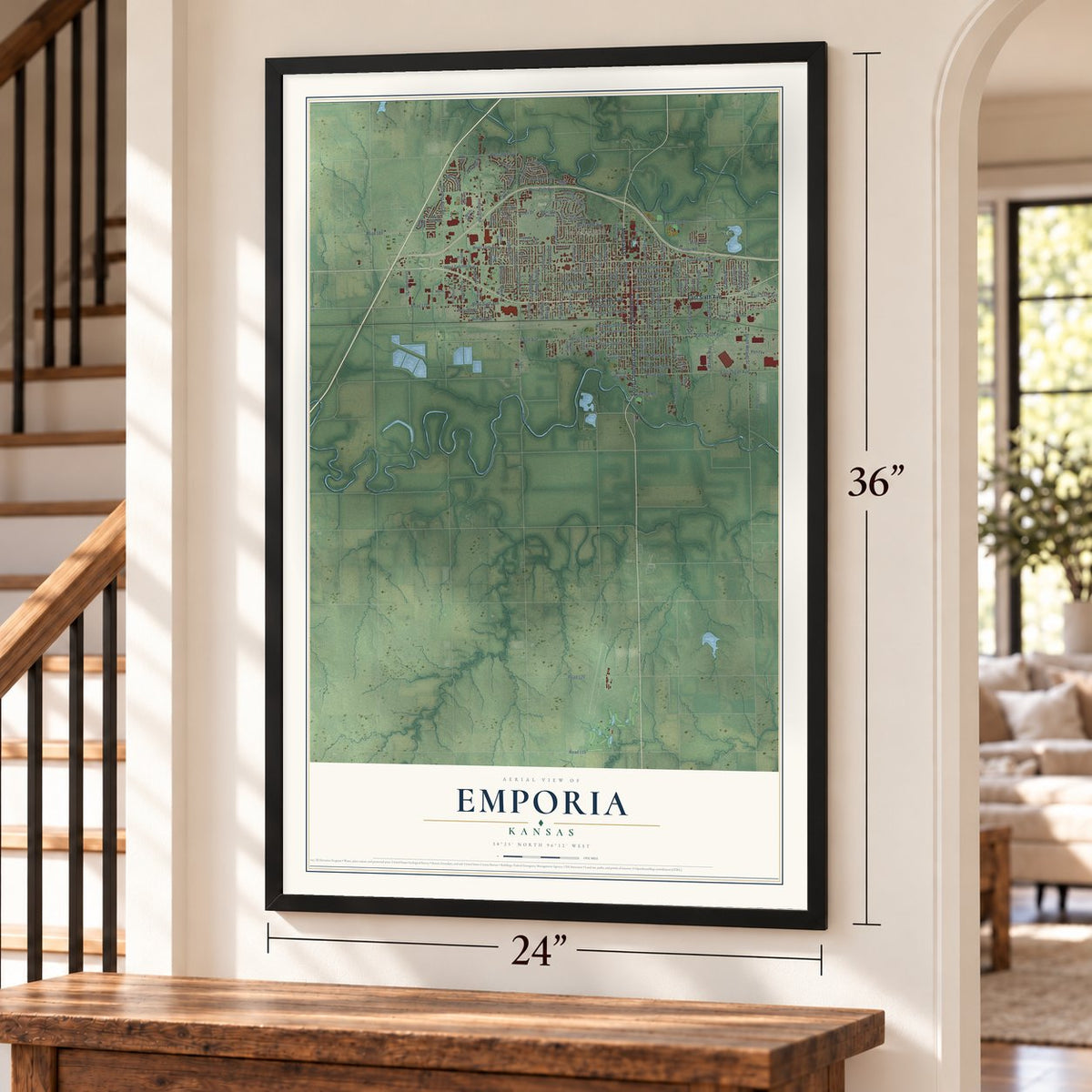 Emporia, Kansas map, 24 x 36 inch print in a black frame by a staircase