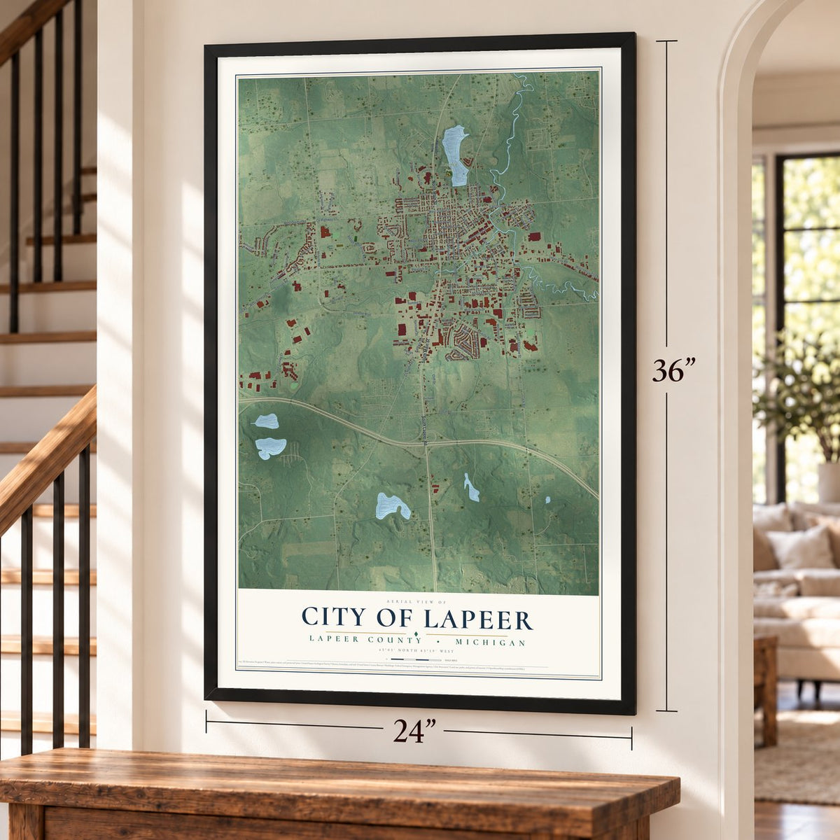 Lapeer, Michigan map, 24 x 36 inch print in a black frame by a staircase