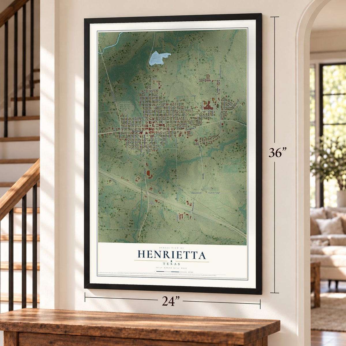 Henrietta, Texas map, 24 x 36 inch print in a black frame by a staircase