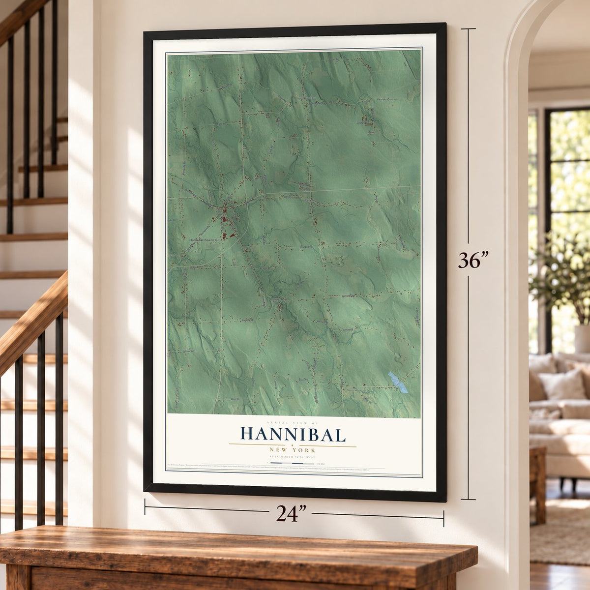 Hannibal, New York map, 24 x 36 inch print in a black frame by a staircase