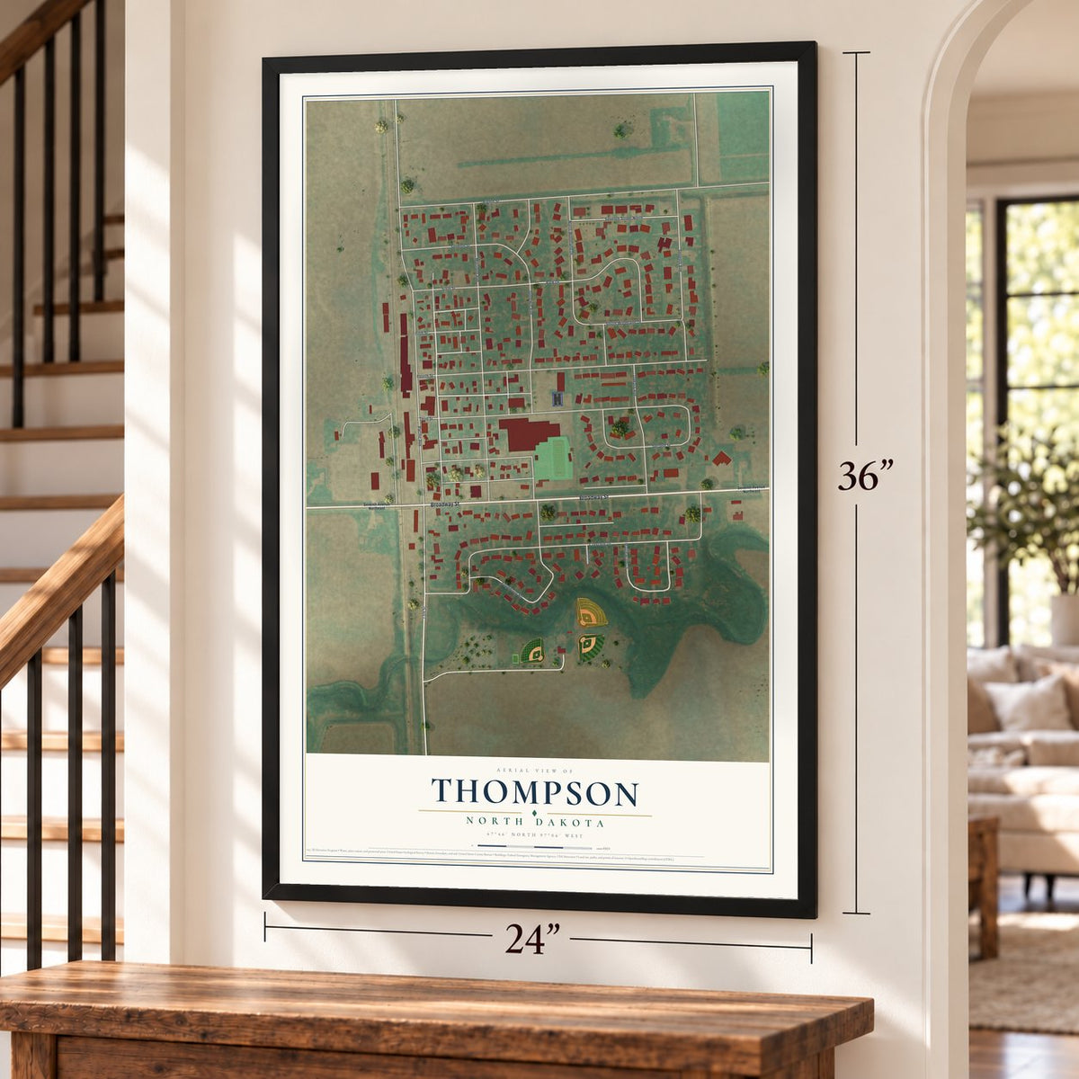 Thompson, North Dakota map, 24 x 36 inch print in a black frame by a staircase