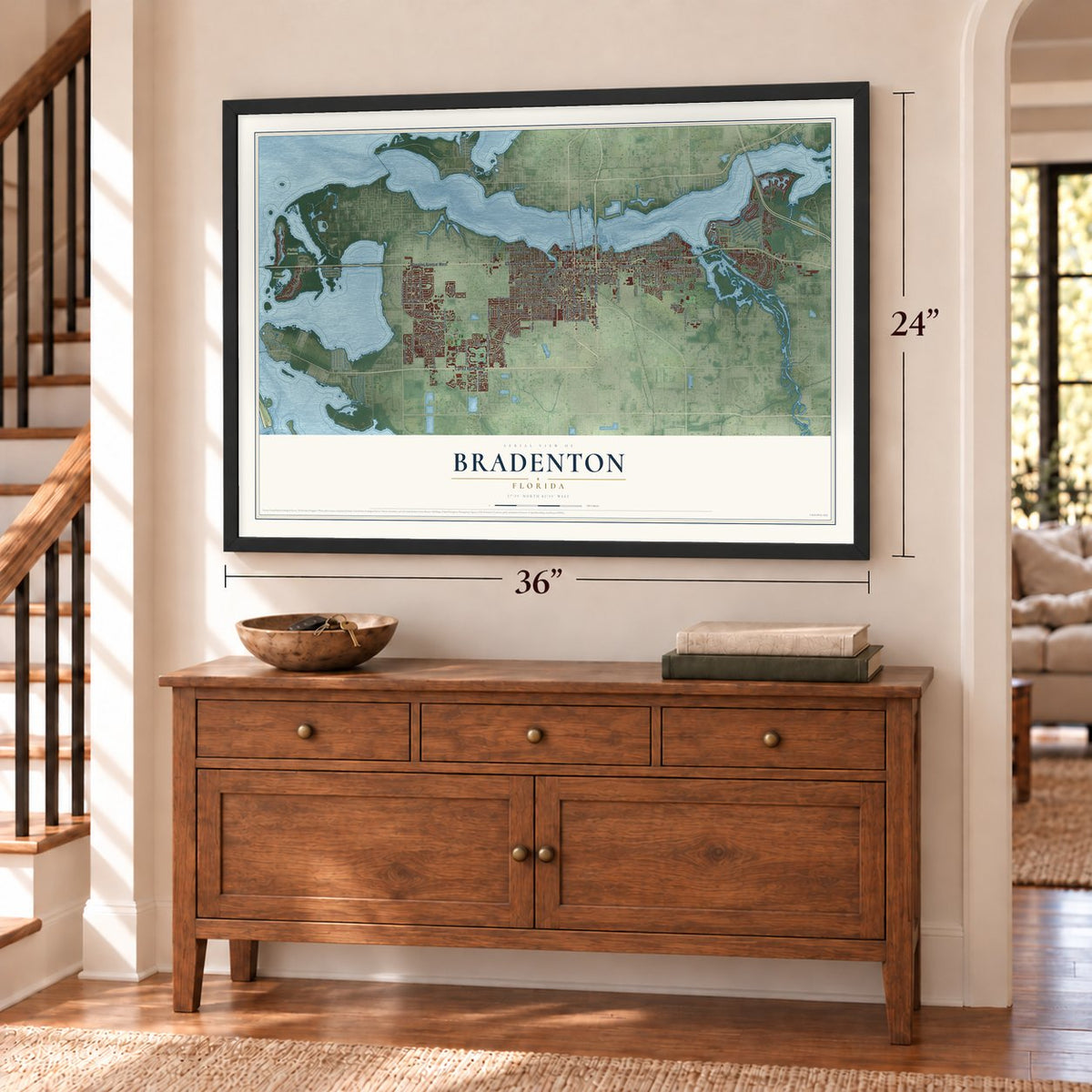 Bradenton, Florida map, 24 x 36 inch print in a black frame above a dresser by a staircase