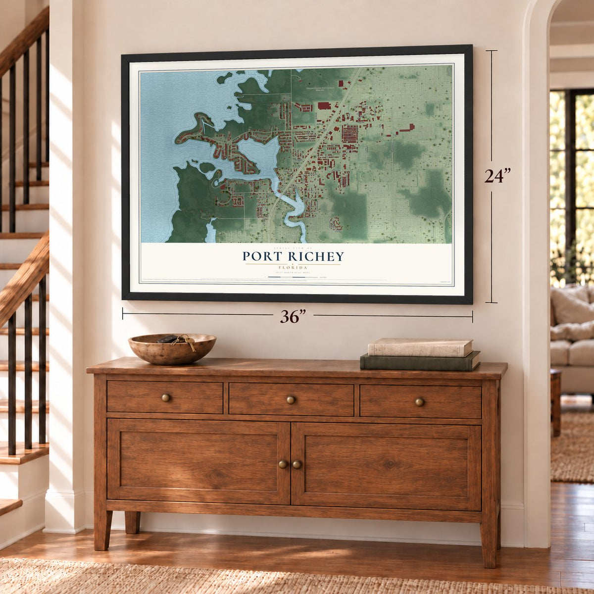 Port Richey, Florida map, 24 x 36 inch print in a black frame above a dresser by a staircase
