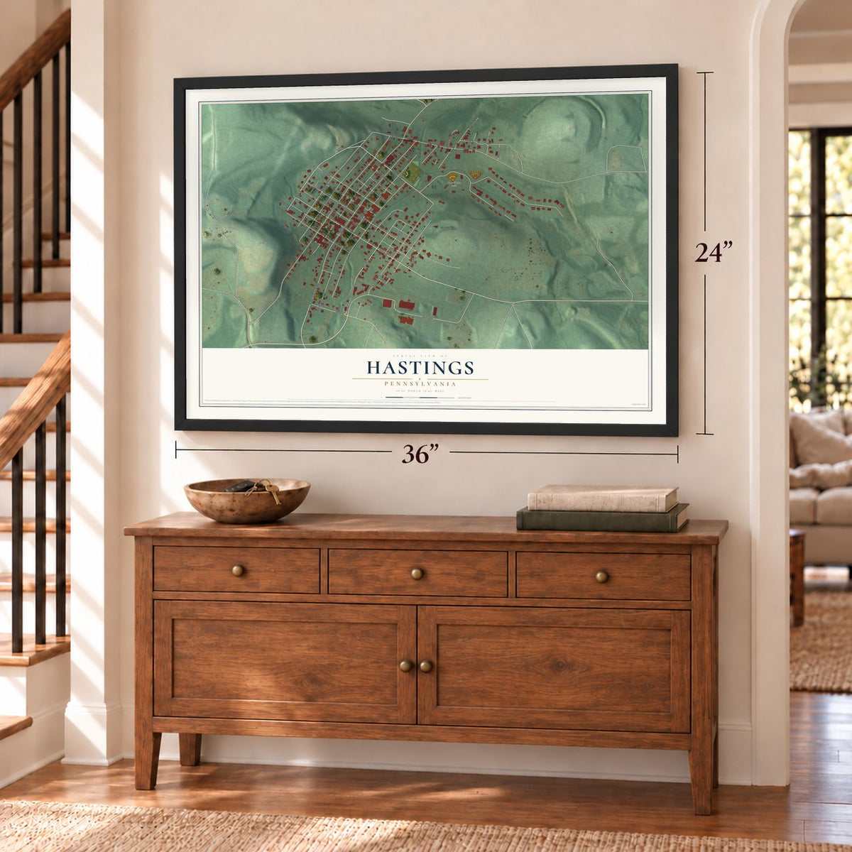 Hastings, Pennsylvania map, 24 x 36 inch print in a black frame above a dresser by a staircase