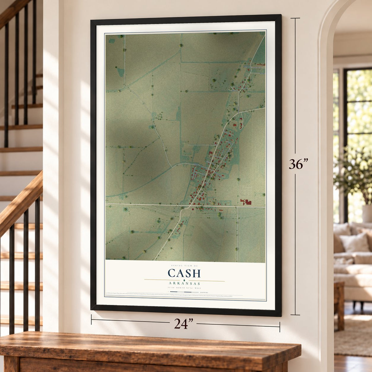 Cash, Arkansas map, 24 x 36 inch print in a black frame by a staircase