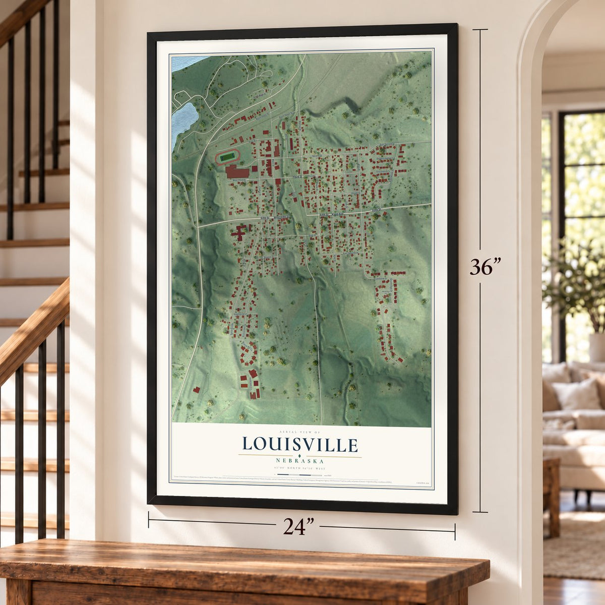 Louisville, Nebraska map, 24 x 36 inch print in a black frame by a staircase
