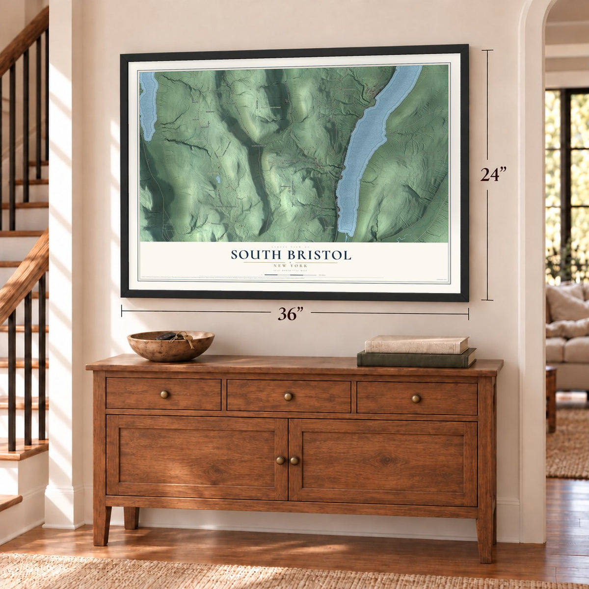 South Bristol, New York map, 24 x 36 inch print in a black frame above a dresser by a staircase