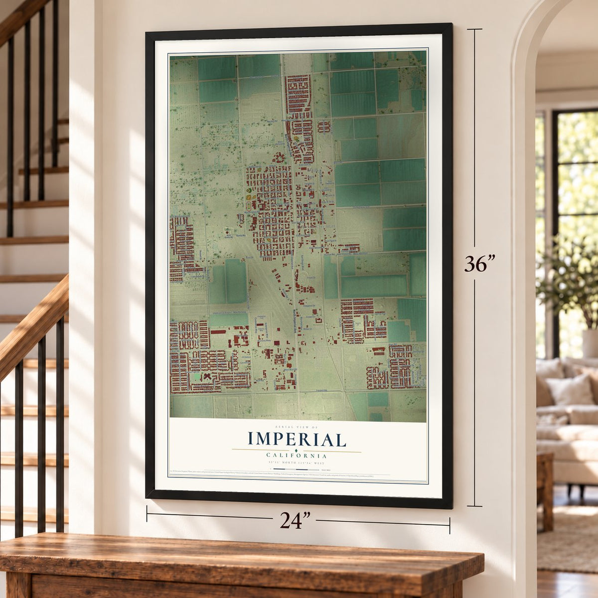 Imperial, California map, 24 x 36 inch print in a black frame by a staircase