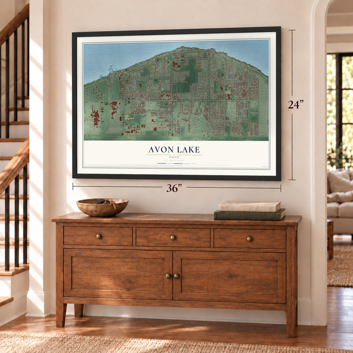 Avon Lake, Ohio map, 24 x 36 inch print in a black frame above a dresser by a staircase