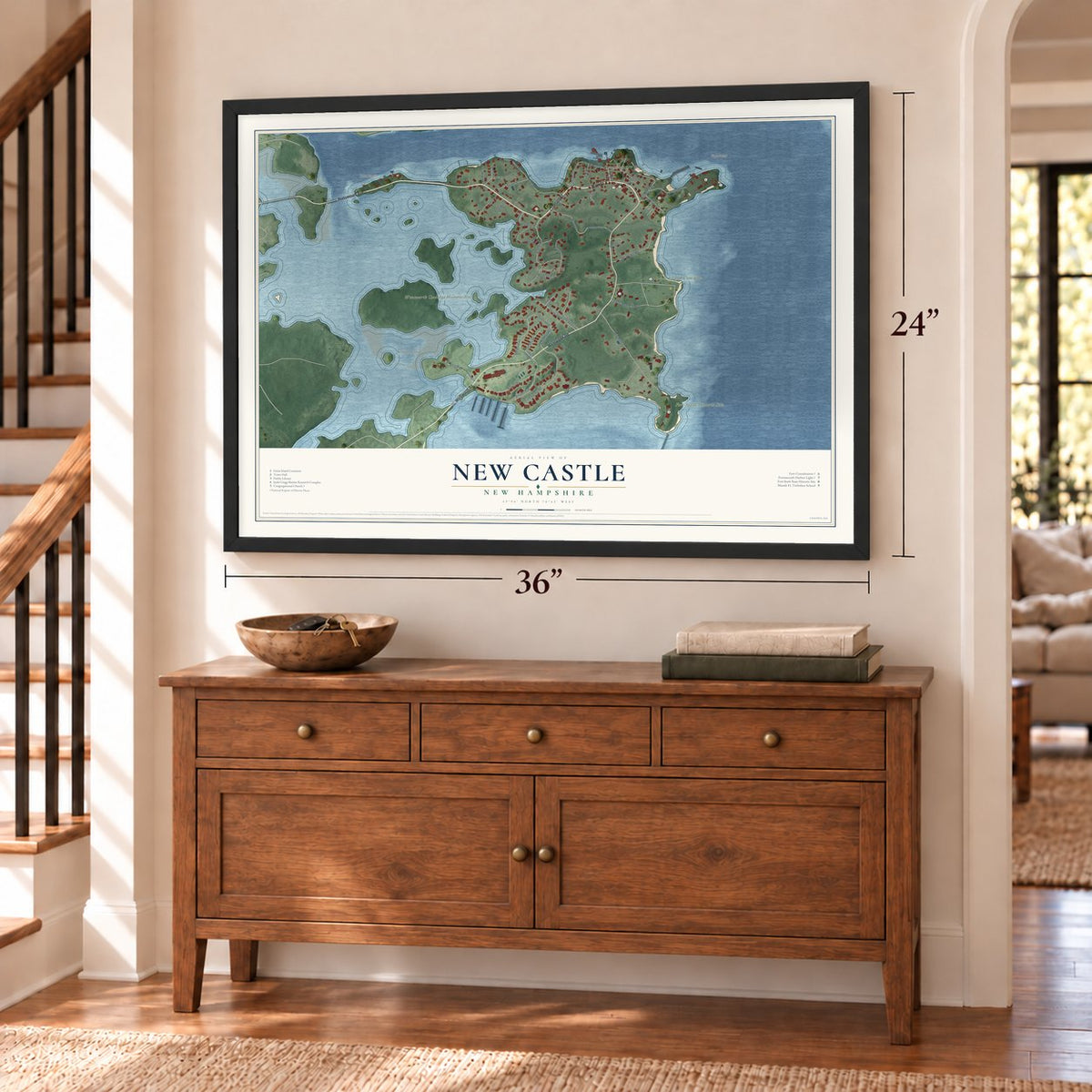 New Castle, New Hampshire map, 24 x 36 inch print in a black frame above a dresser by a staircase